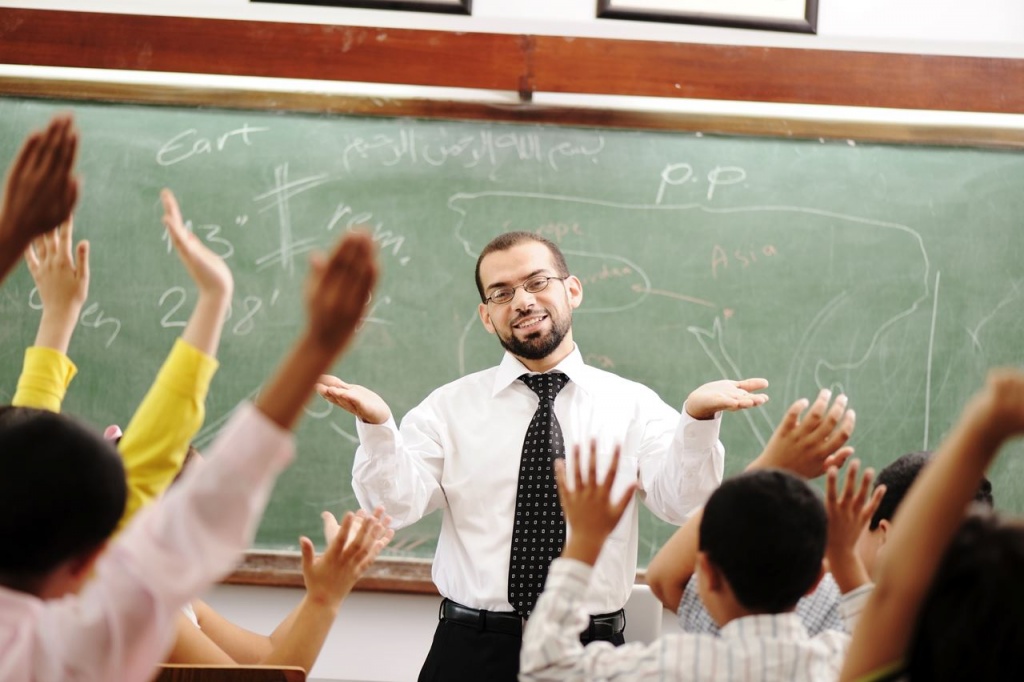 Interaction between teacher and children, funny class in school